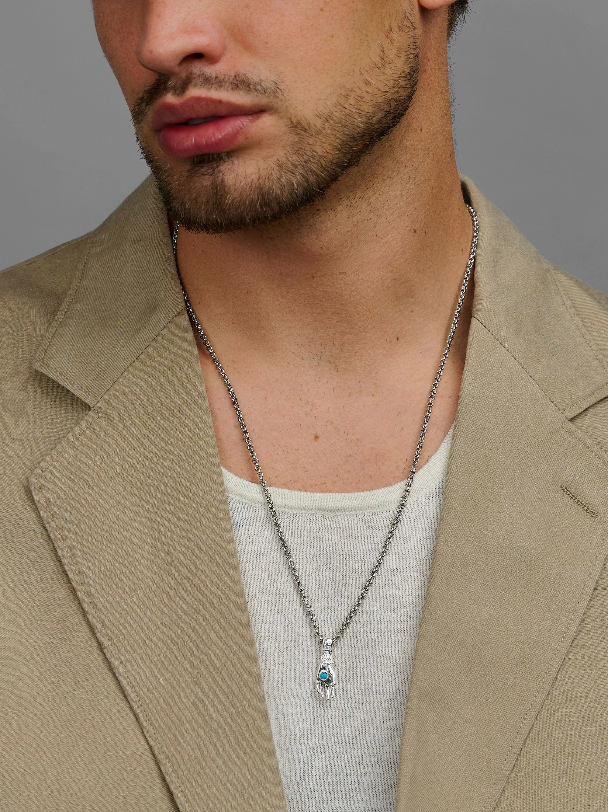 Men's Hand Pendant with a Small Turquoise Gemstone in Silver