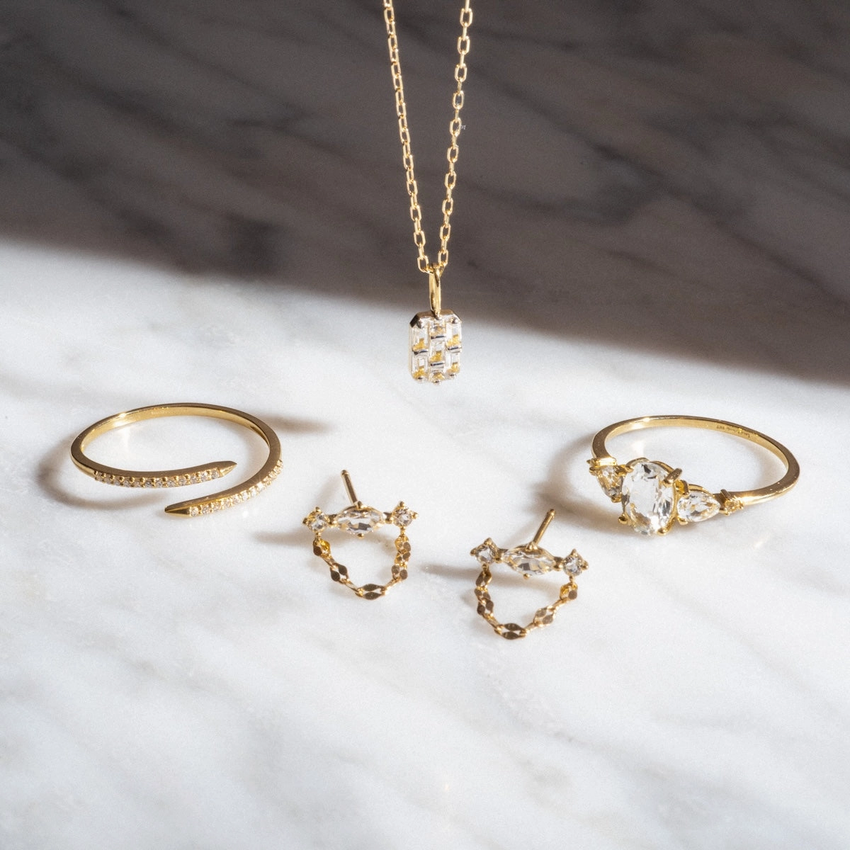 Solid Gold 2025 April Capsule White Topaz Wrapped Stacking Ring