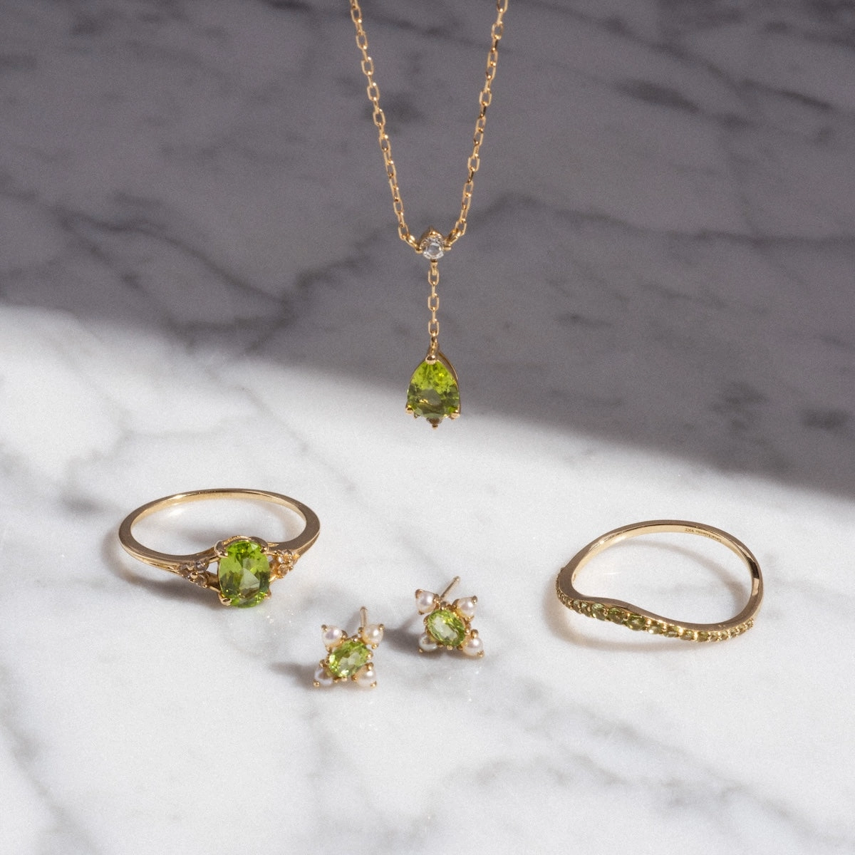 Solid Gold 2025 August Capsule Curved Peridot Stacking Ring