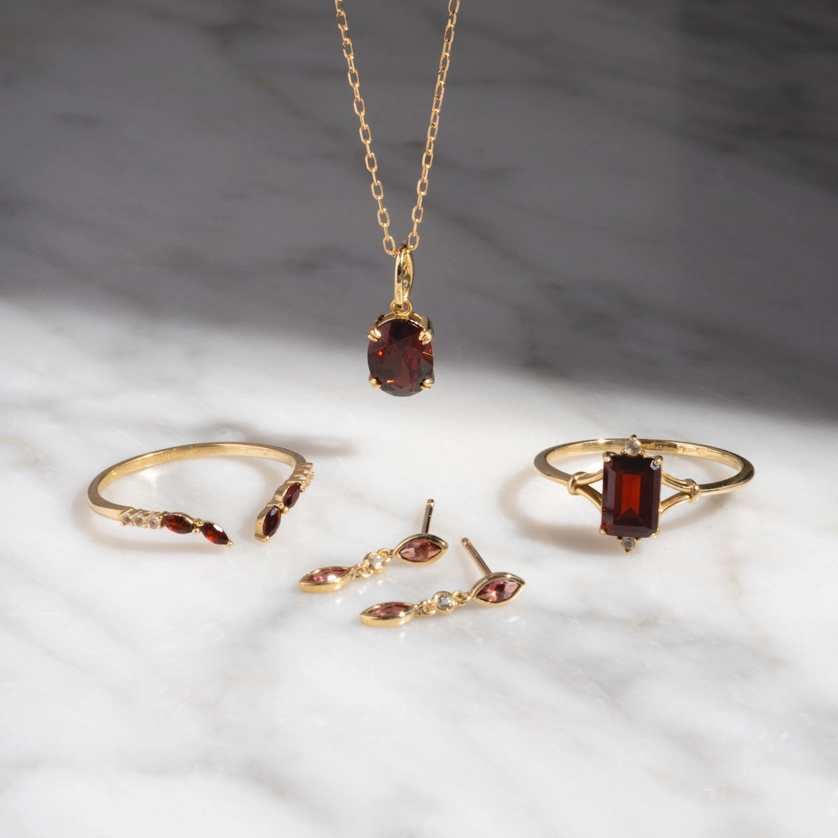 Solid Gold 2025 January Capsule Garnet Stacking Set with Free Gift