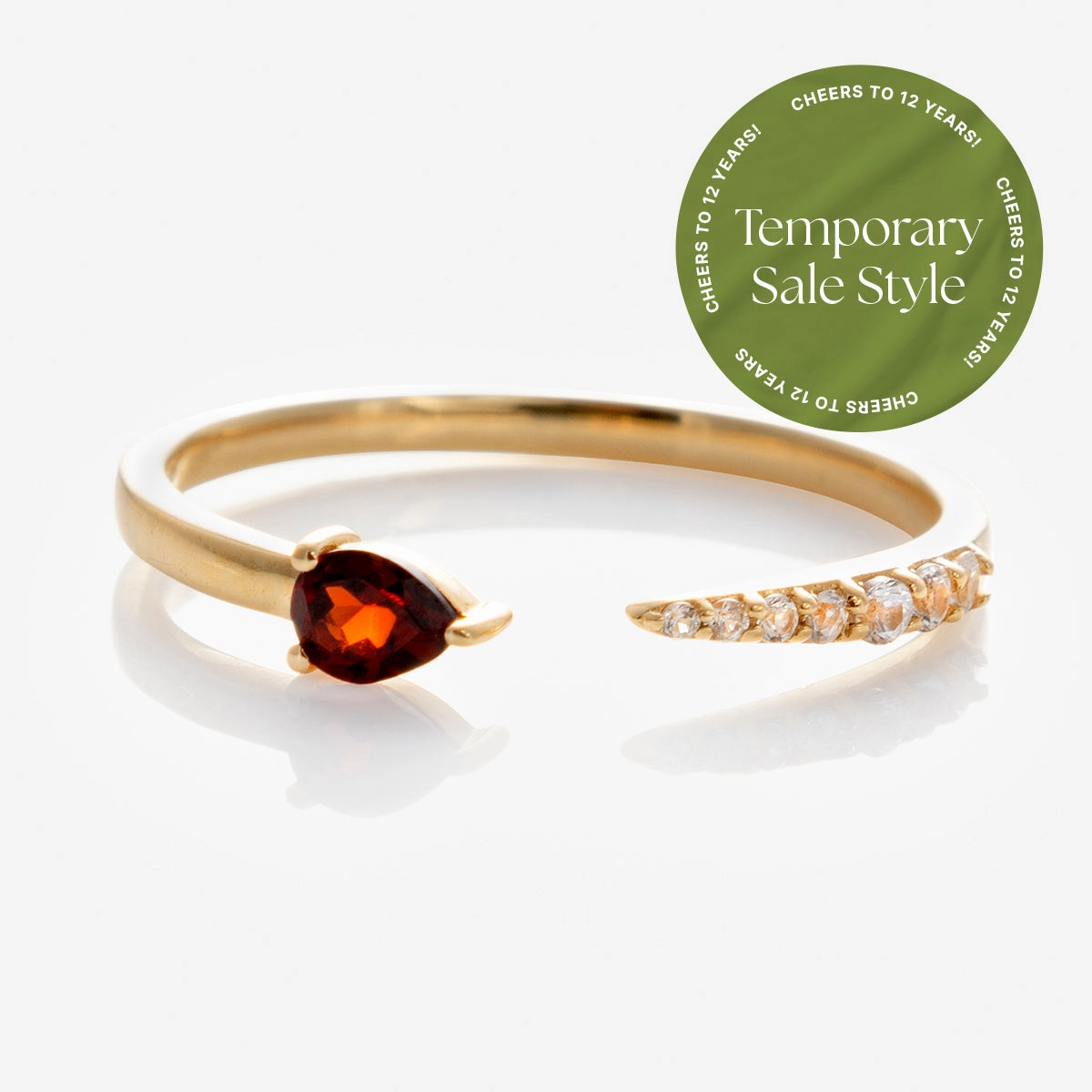 Solid Gold Garnet and Sapphire Open Front Band